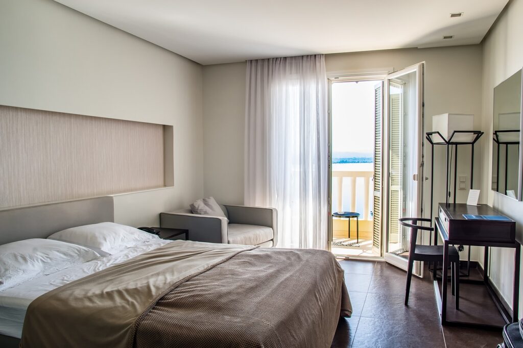 Hotel room with brown linens